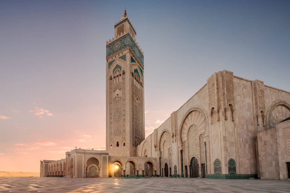 Ray of light at Hassan II Mosque, largest mosque in Morocco. Shot after sunset at blue hour in Casablanca.