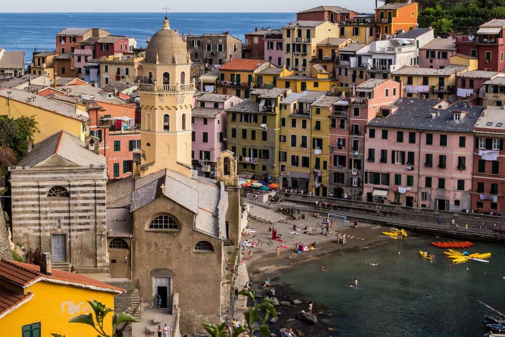 Vernazza, Italy -  View of Old Traditional Houses, Santa Margherita di Antiochia Church and Vernazza Beach