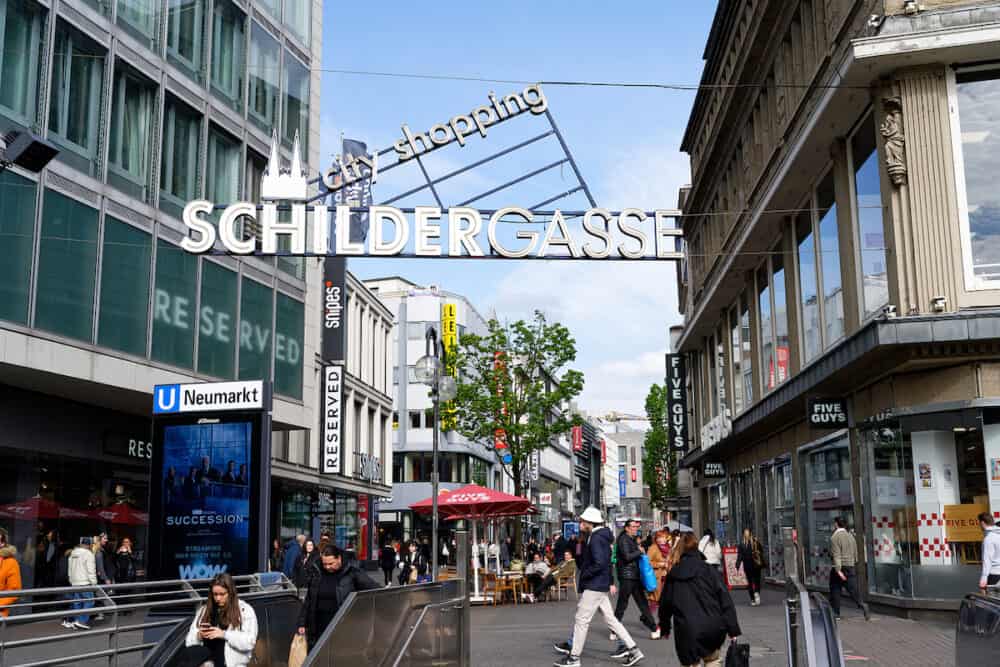 Cologne, Germany - advertising sign of the busiest shopping street in germany Schildergasse in cologne