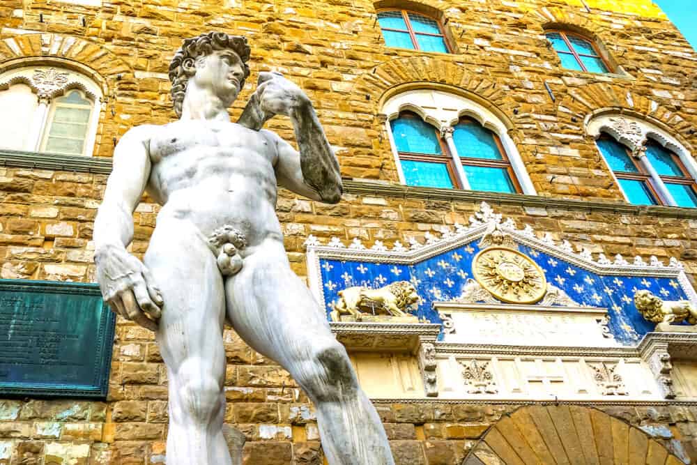 Michelangelo David Replica Statue Piazza Signoria Palazzo Vecchio Florence Tuscany Italy.  Replica of Michelangelo's David statue in front of Palazzo Vecchio, Florence Town Hall