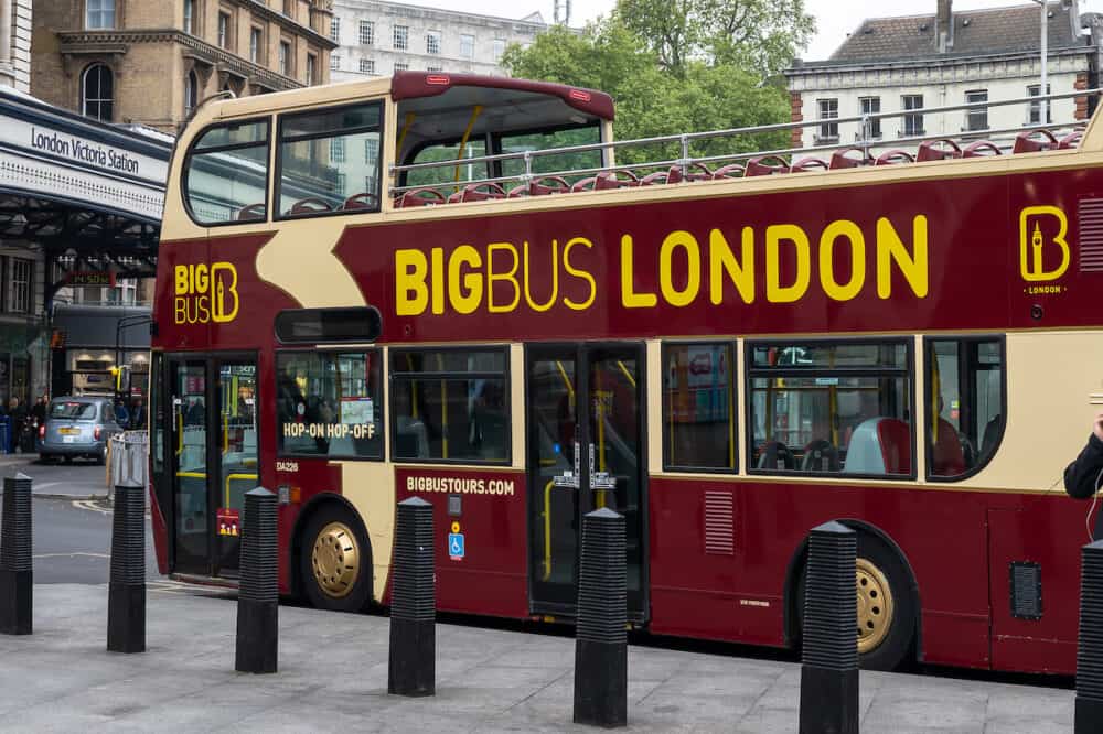 London, UK-  BigBus London double decker tourist bus outside Victoria train station in London