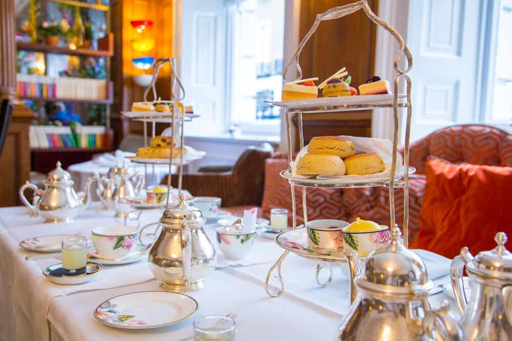 London, UK. Classical London afternoon tea with english breakfast in a luxury hotel.