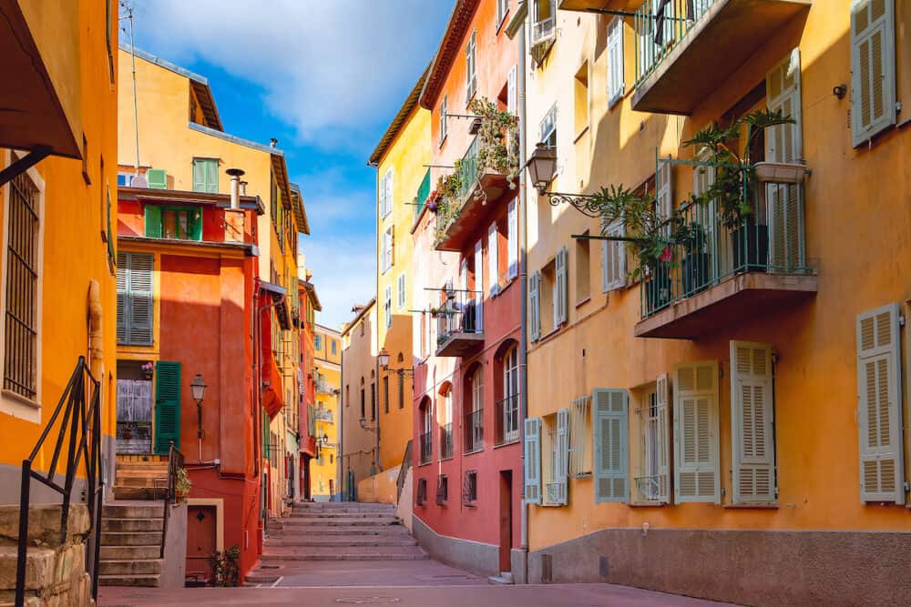 Sunny colorful historical houses in Old Town of Nice, French Riviera, Cote dAzur, France