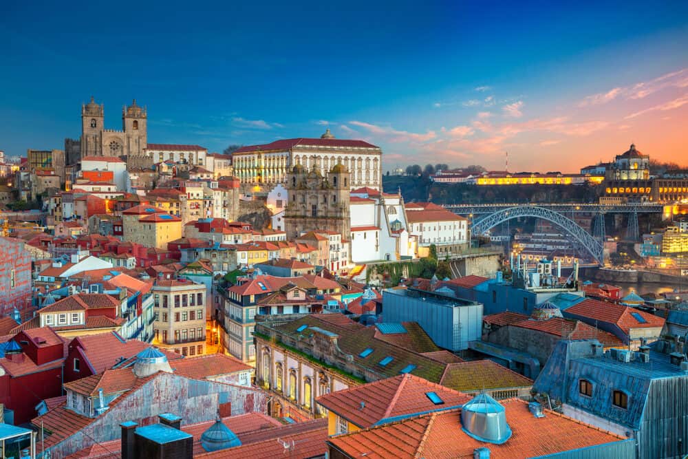 Porto, Portugal. Aerial cityscape image of Porto, Portugal with the Porto Cathedral and old town during sunset.