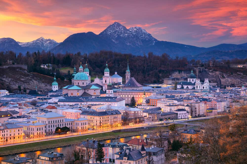 Salzburg, Austria. Cityscape image of the Salzburg, Austria with Salzburg Cathedral during beautiful winter sunset.