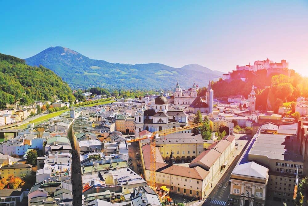 Aerial view of the historic city of Salzburg with Festung Hohensalzburg Fortress and Salzburger Dom. Old town scenery sights. Salzburger Land, Austria. Unesco heritage.