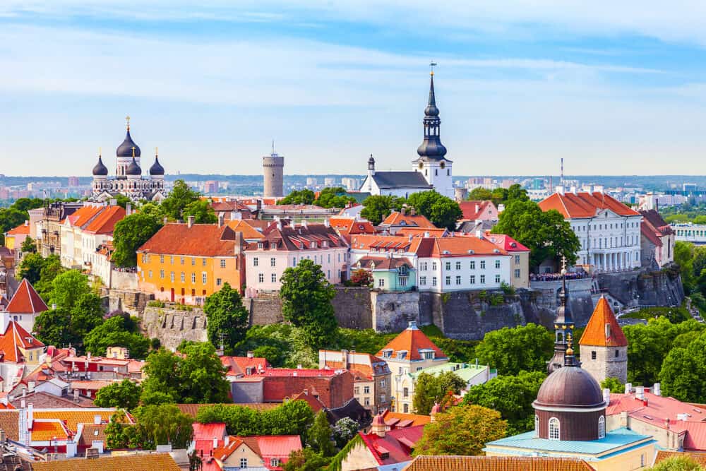 View from tower of Saint Olaf Church on old city of Tallinn and roofs of old houses. Tallinn Estonia.
