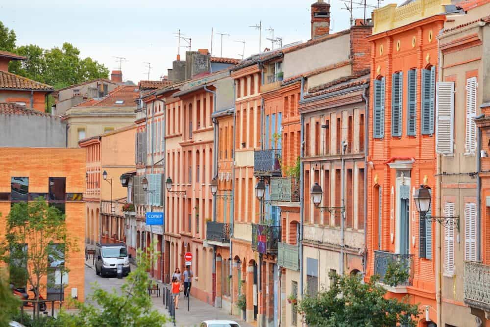 TOULOUSE, FRANCE - People visit Toulouse city, St-Cyprien district. Toulouse is the 4th largest commune in France.