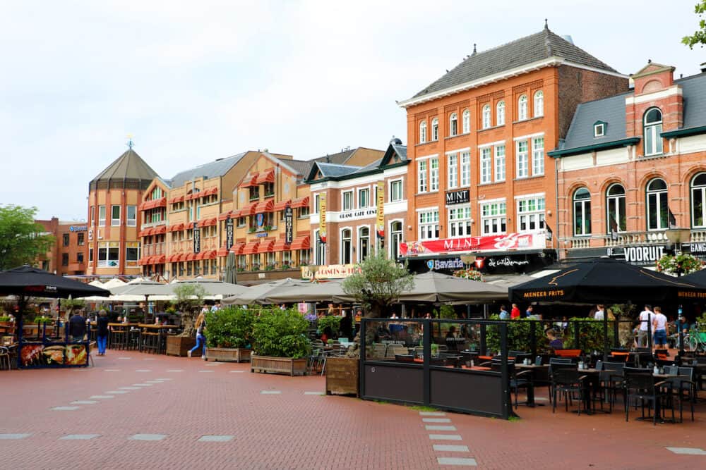 EINDHOVEN, NETHERLANDS -  people in restaurants at Markt square, Eindhoven, Netherlands