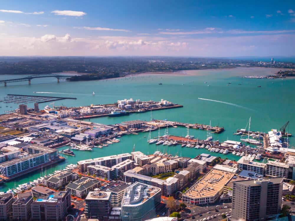 Aerial view of Auckland harbour marina on a sunny day with blue sea