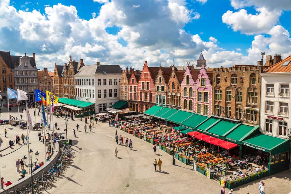 BRUGES BELGIUM - Panoramic view of Market Square in Bruges in a beautiful summer day Belgium