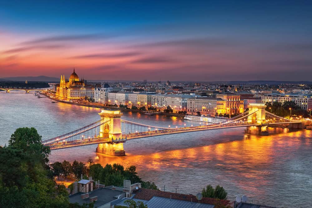 Budapest Hungary Sunset Panorama of Budapest Hungary with the Chain Bridge and the Parliament.