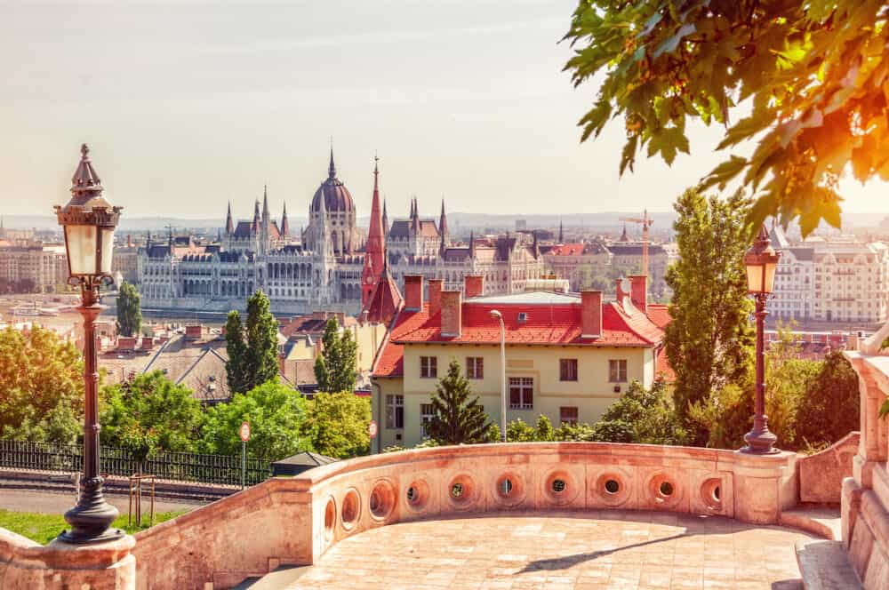 Budapest Hungary. Beautiful panoramic view from the Fishermen Bastion at the Hungarian Parliament Building. Image filtered with cross processed.