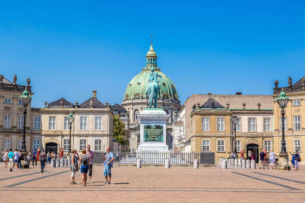 COPENHAGEN DENMARK - Frederik's Church popularly known as The Marble Church and castle Amalienborg with statue of Frederick V in Copenhagen Denmark 