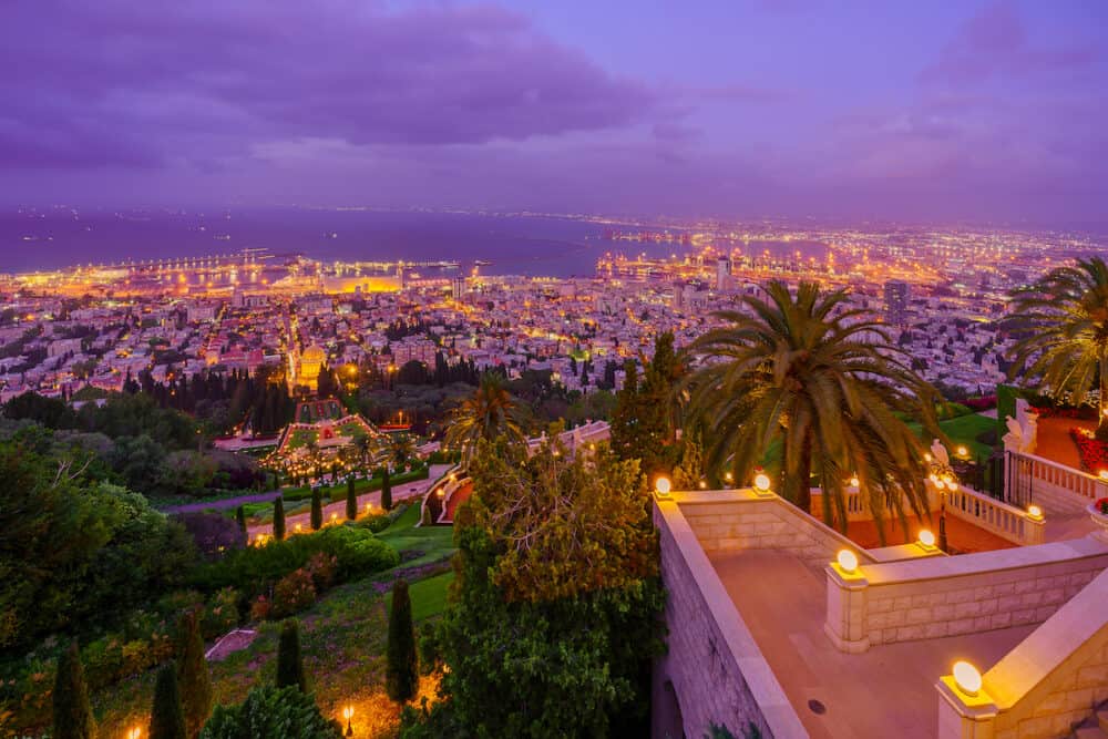 Haifa, Israel -  Sunset view of the Bahai shrine and gardens, downtown and the harbor, in Haifa, Northern Israel