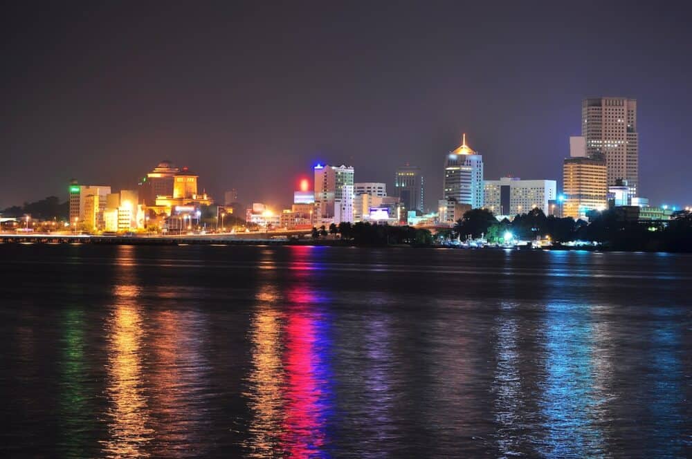 Johor Bahru cityscape with colourful light reflection on Johore Strait