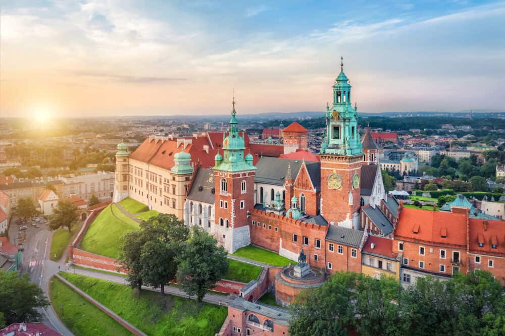 Krakow, Poland. Aerial view of Clock Tower in Wawel Royal Castle on sunrise