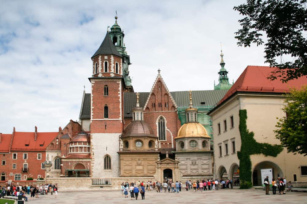 Krakow Poland - Unidentified tourists visiting Wawel Cathedral - Polish national sanctuary and coronation site of the Polish monarchs.