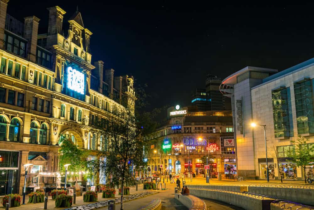 MANCHESTER, UK - the Printworks urban entertainment venue at night with stores and restaurants in England, United Kingdom