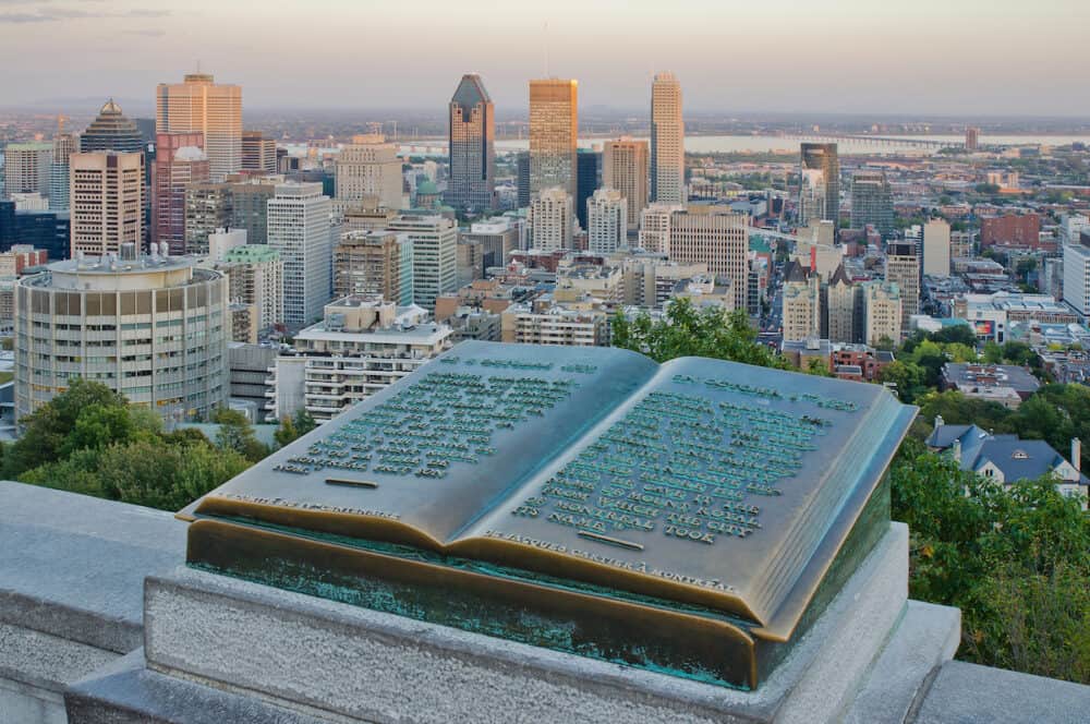 Montreal, CANADA - Downtown Montreal and Plaque of Jacques Cartier located on the Mount Royal
