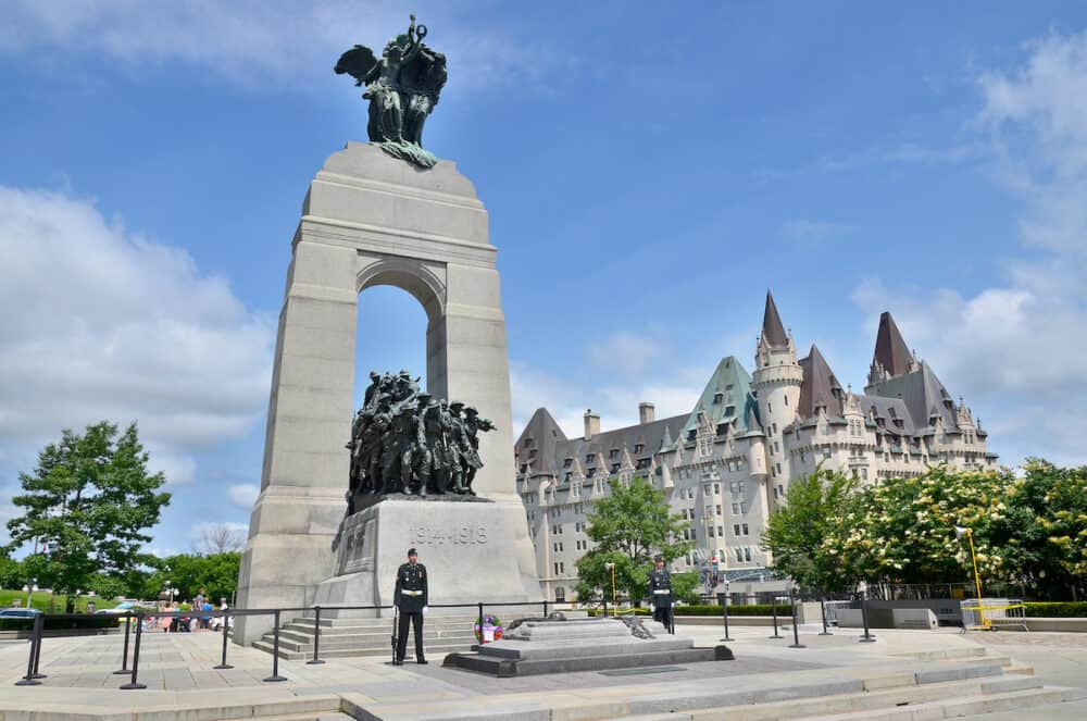 OTTAWA, CANADA - The National War Memorial , is a tall granite cenotaph with acreted bronze sculptures, that stands in Confederation Square