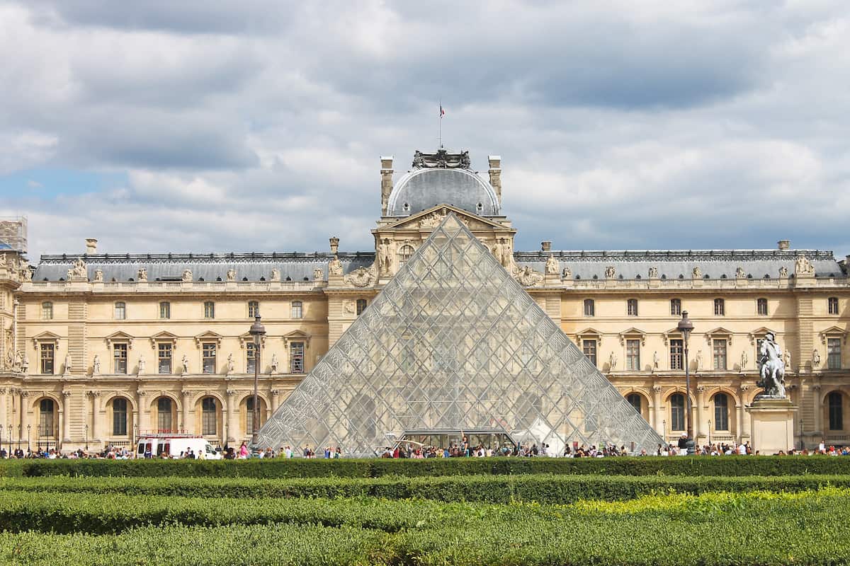 PARIS, FRANCE - People in square in front of Louvre. Paris. France