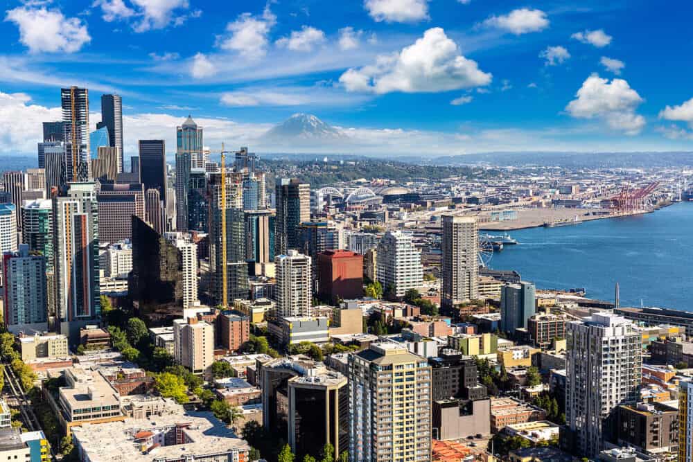 Panoramic aerial view of Seattle business district with Mount Rainier in the background in a sunny day in Seattle, USA