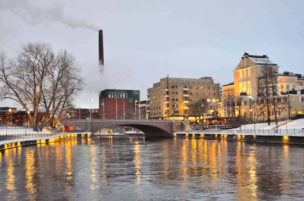 Tampere Finland. River Tammerkoski embankments at winter twilight