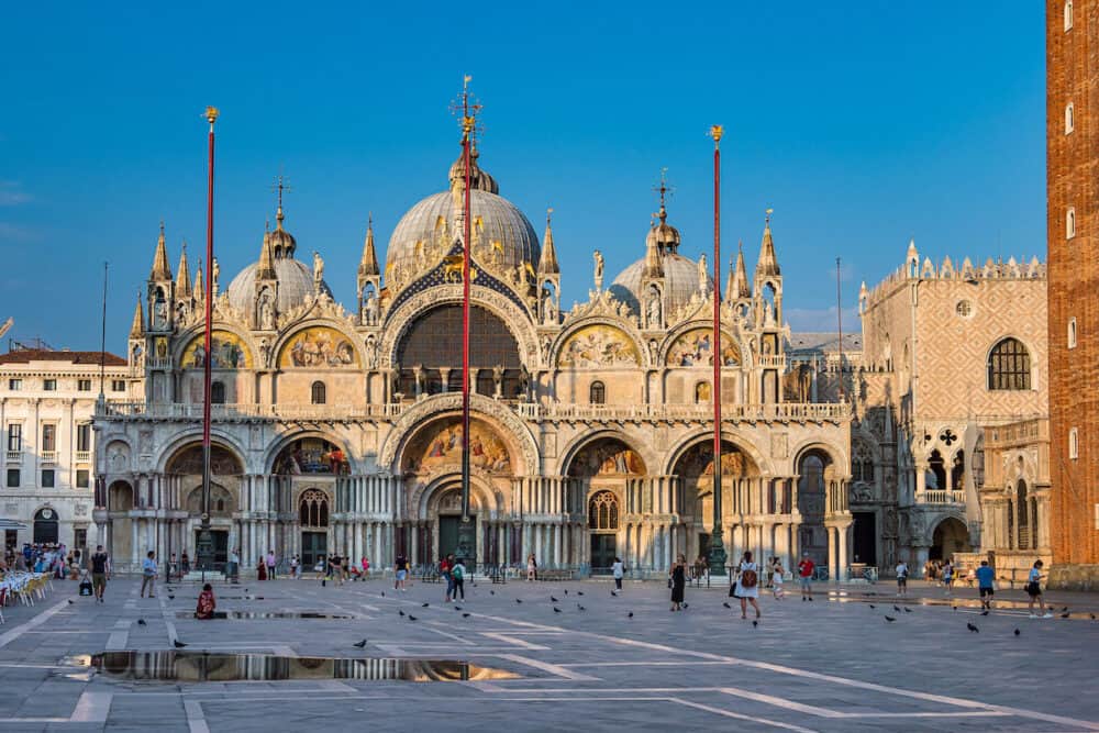 Venice, Italy - St. Mark's square, San Marco is the tourist heart of Venice with iconic sights of St. Mark's basilica, campanile cathedral tower and Doge's Palace