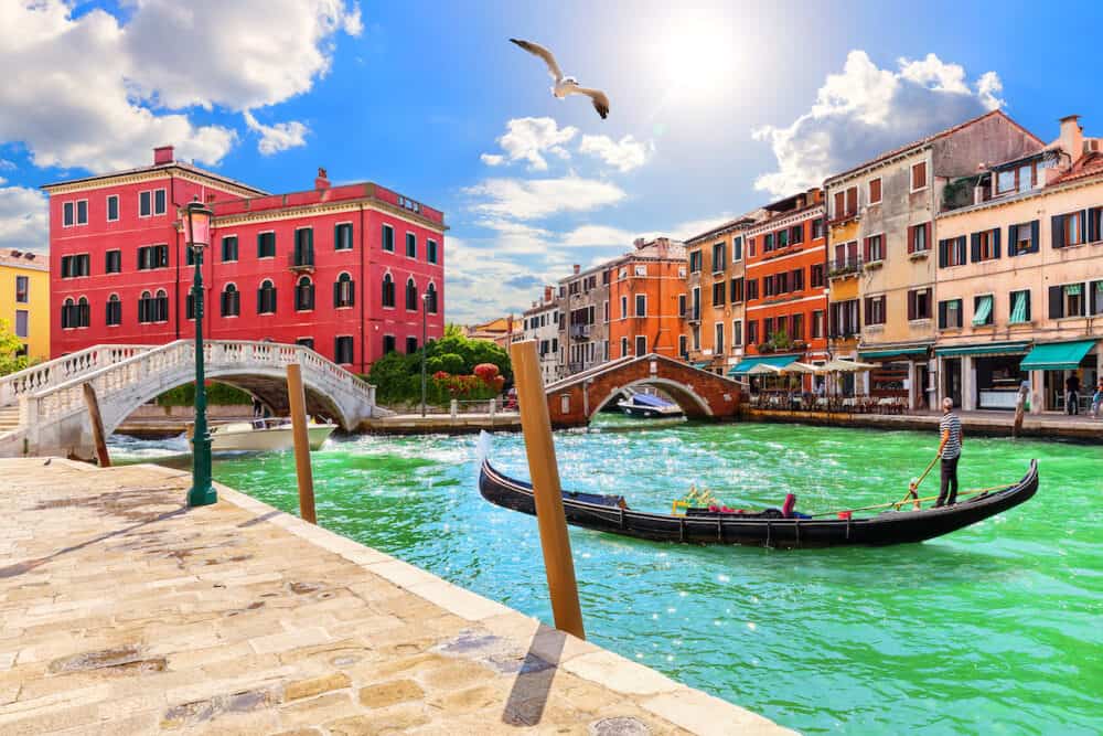 Venice canals, gondola and medieval bridges, beautiful view of Italy