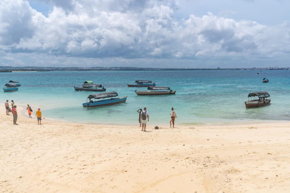 Zanzibar, Tanzania - Tourists wait for boats on Prison Island (Changuu Island) to return to Zanzibar mainland