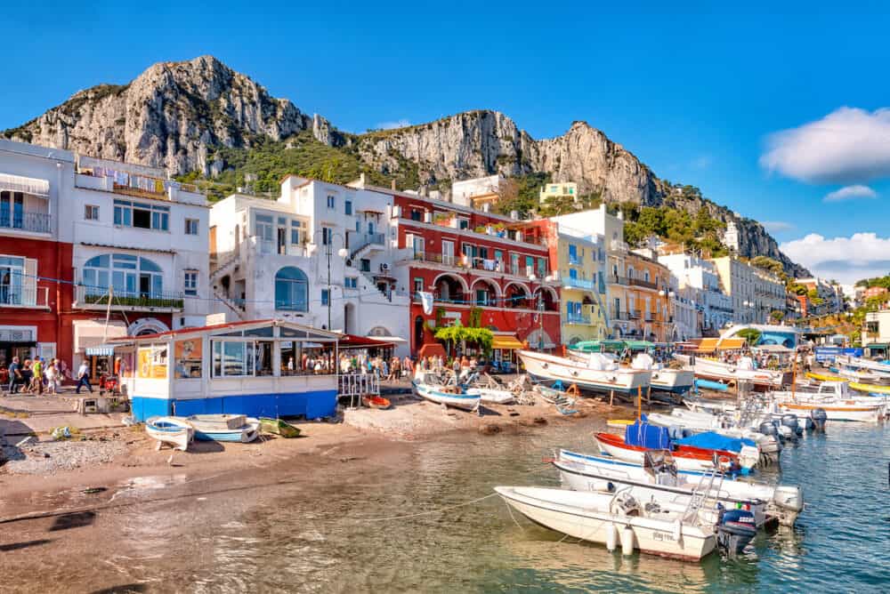Capri, Italy - View of the town of Marina Grande, the main port of the island of Capri, at the foot of Mount Solaro. Boats operate from here to Naples on the Italy mainland