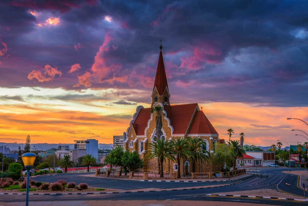 Dramatic sunset above Christchurch, a historic landmark and Lutheran church in Windhoek, capital city of Namibia.