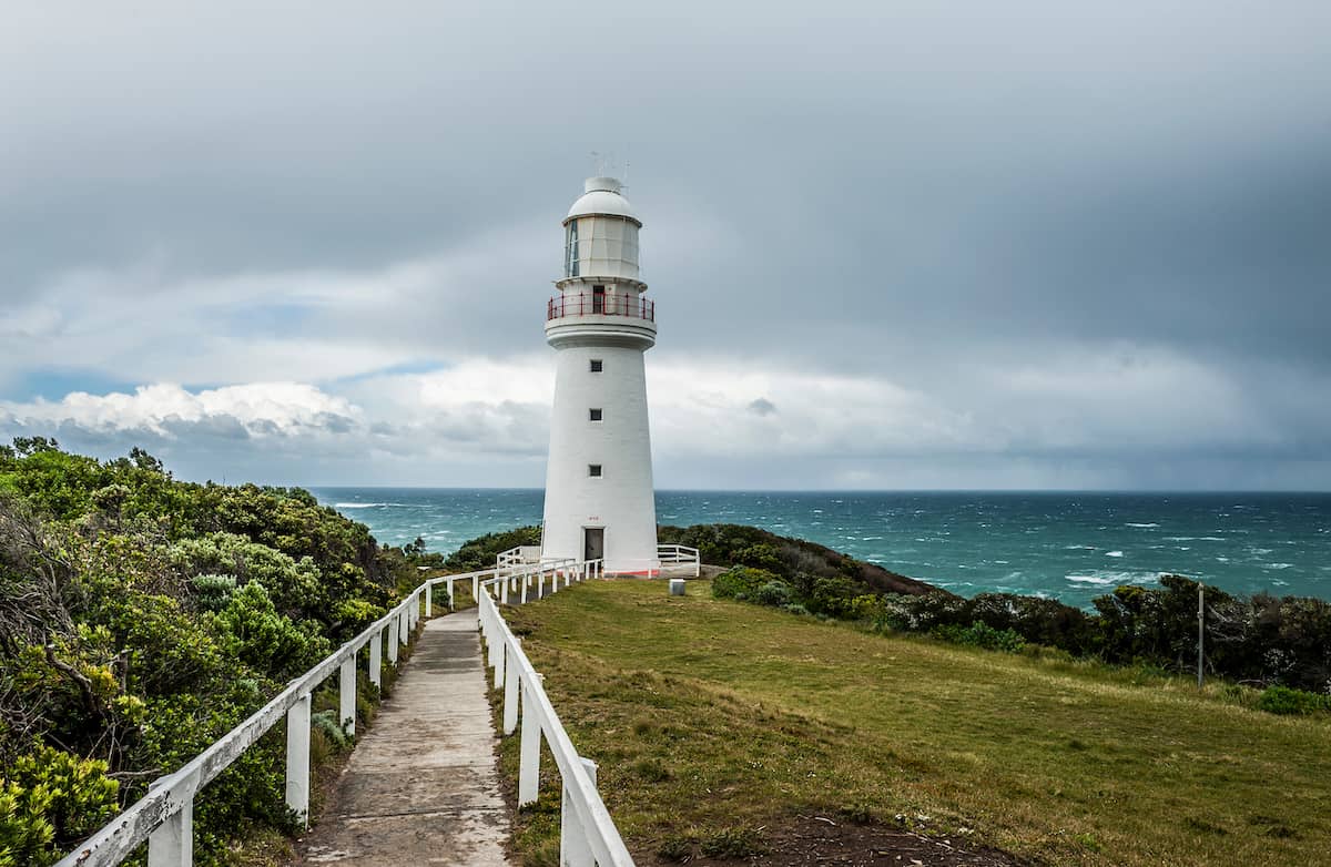Famous Cape Otway lighthouse near the Great Ocean Road on southern coast of Victoria state, Australia. The oldest lighthouse in Australia