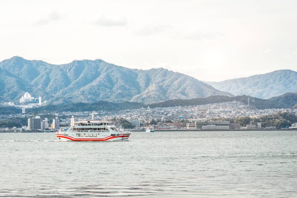 Ferry-boat in island of Miyajima - Hiroshima Japan. View from the Miyajimaguchi city pier