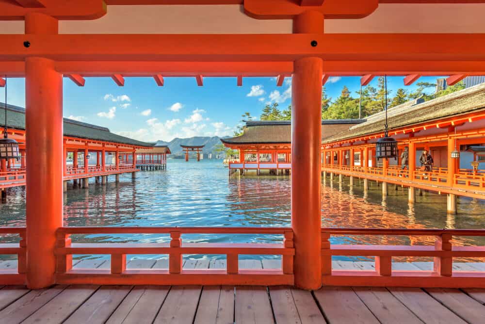 HIROSHIMA, JAPAN - The open air halls of Itsukushima Shrine on Miyajima Island. The shrine is known for the famous floating torii gate.
