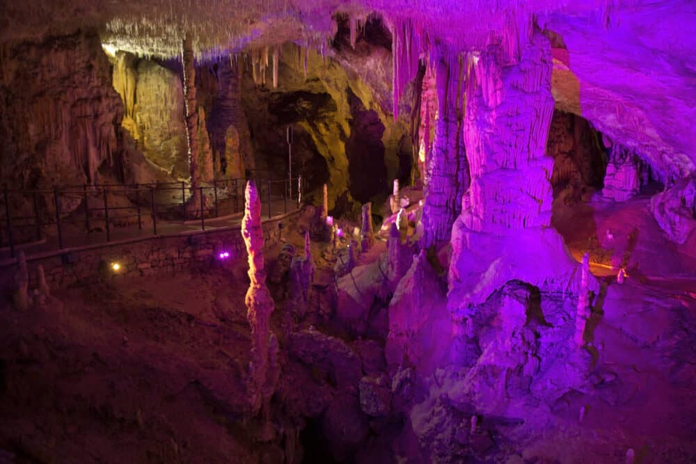 Stalactites and stalagmites in Postonja Cave, Slovenia.