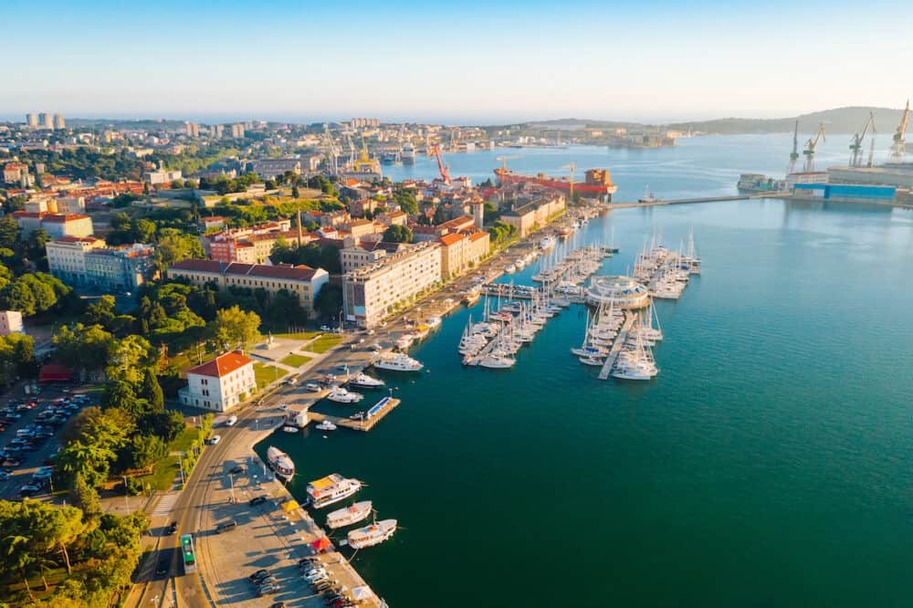 Aerial drone photo of famous European city of Pula. Location place Istria county, Croatia, Europe. Popular touristic place. Aerial photography, drone shot. Discover the beauty of earth.