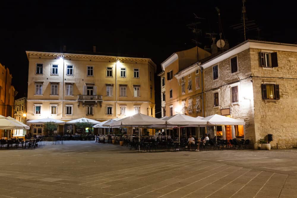 Illuminated Downtown in the City of Pula at Night Croatia