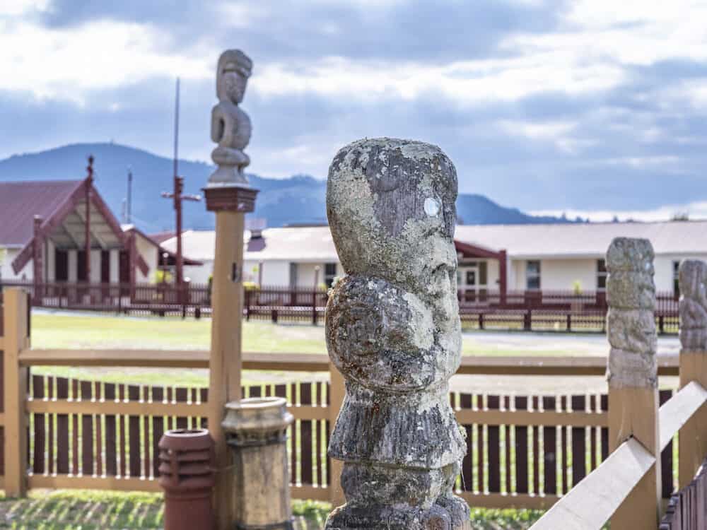 statue at Wharenui or Maori meeting house, Tamatekapua Marae, Ohinemutu, Te Arawa tribe, Rotorua, Rotorua District, New Zealand.