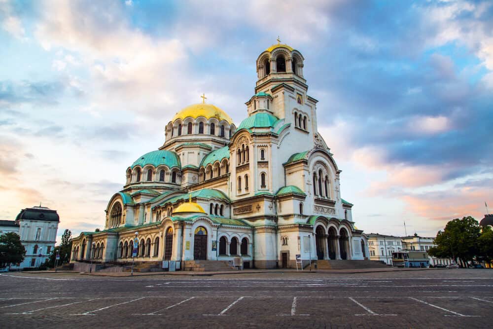 St. Alexander Nevsky Cathedral in the center of Sofia capital of Bulgaria against the blue morning sky with colorful clouds