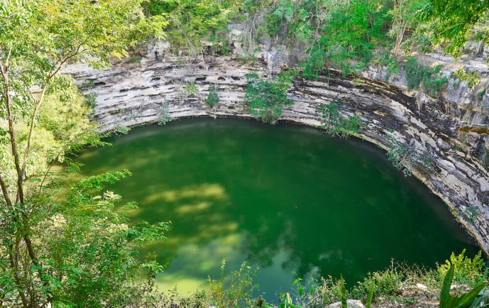 Cenote Sagrado sacred sinkhole in Chichen Itza at Yucatan Mexico