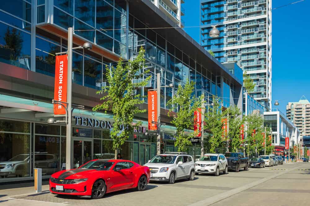 Street view of city buildings in downtown Burnaby, shopping centre Metrotown area, Vancouver BC, Canada.