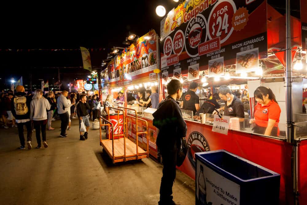Visitors at the Richmond night market near Vancouver enjoying food and fun July 10 2016. The market attracts visitors from around the world for its ethnic food unique shops and nightly street entertainment.