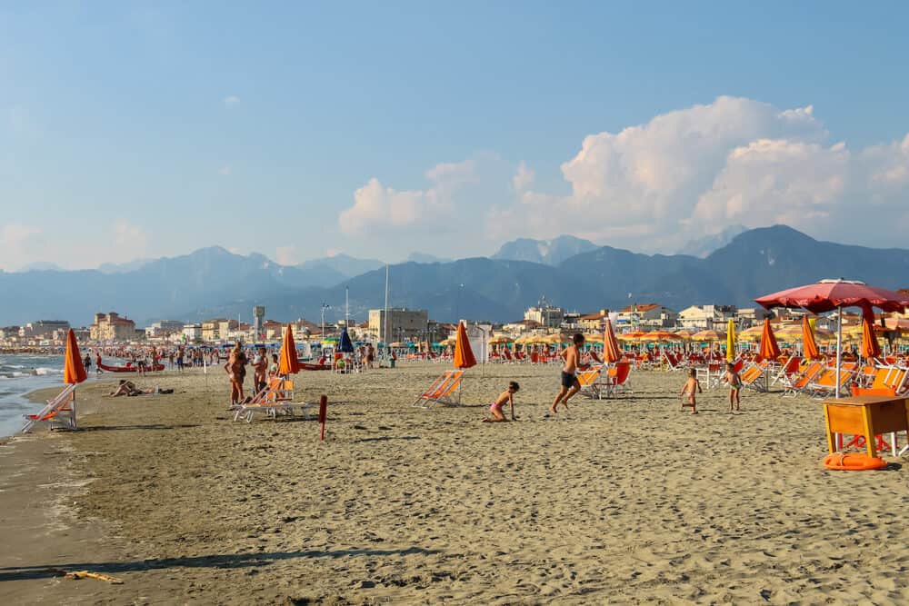 Viareggio Italy - People resting on the beach. Viareggio is the famous resort on the coast of the Ligurian Sea