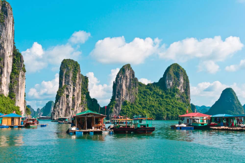 Floating village and rock islands in Halong Bay Vietnam Southeast Asia