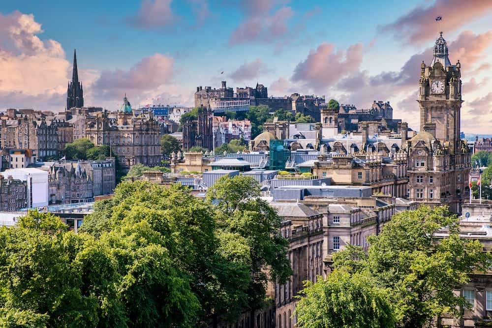 Panoramic view of the city of Edinburgh in Scotland at sunset - With a view of several famous landmarks