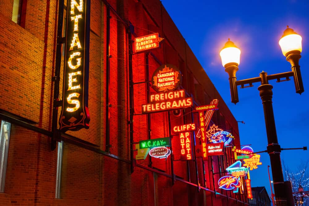 EDMONTON, CANADA - Free outdoor public Neon Sign Museum is a collection of historic neon signs from old or demolished buildings and brought back to life for display on the 4th Street Promenade in downtown Edmonton, Alberta, Canada.