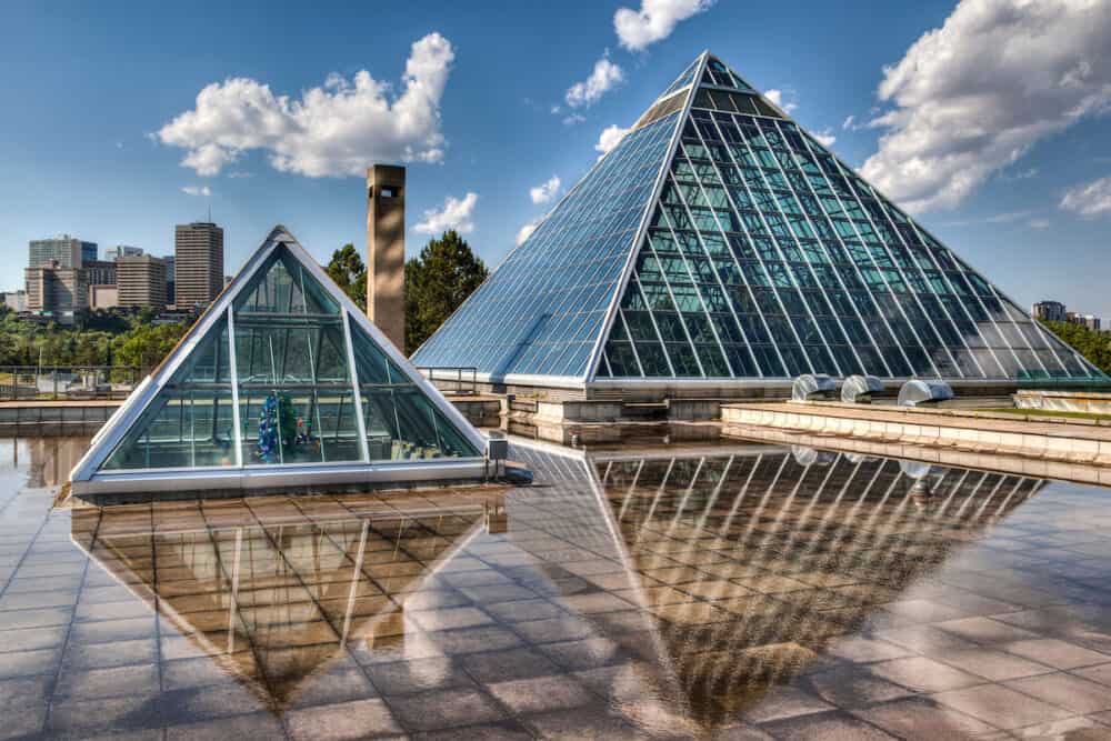 The Muttart Conservatory stands against the Edmonton skyline July 8, 2014. The buildings' glass pyramids are one of Edmonton's most famous icons built in 1976.
