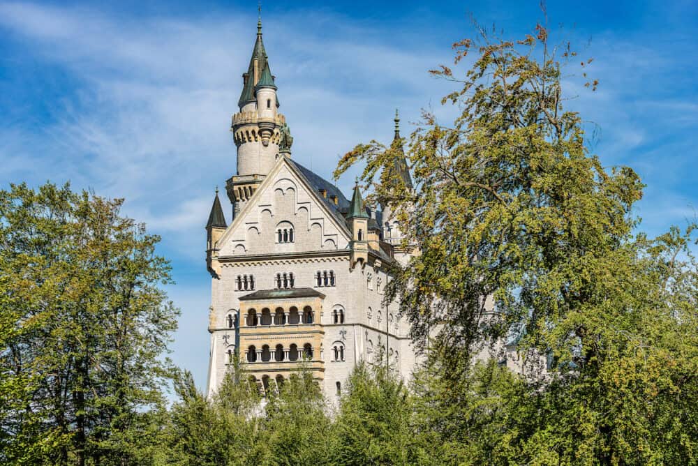 Famous Neuschwanstein Castle (New Swanstone Castle - Schloss Neuschwanstein XIX century), landmark in the Bavarian Alps, Germany. One of the most visited castles in Europe